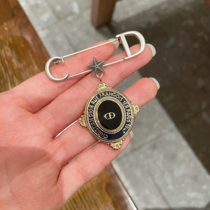 CD New Alphabet brooch