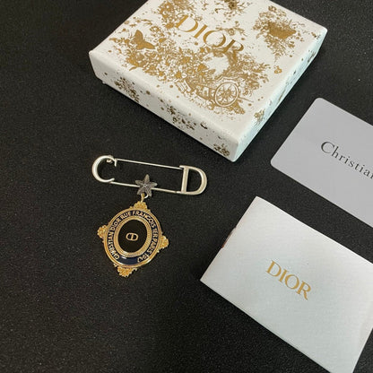 CD New Alphabet brooch