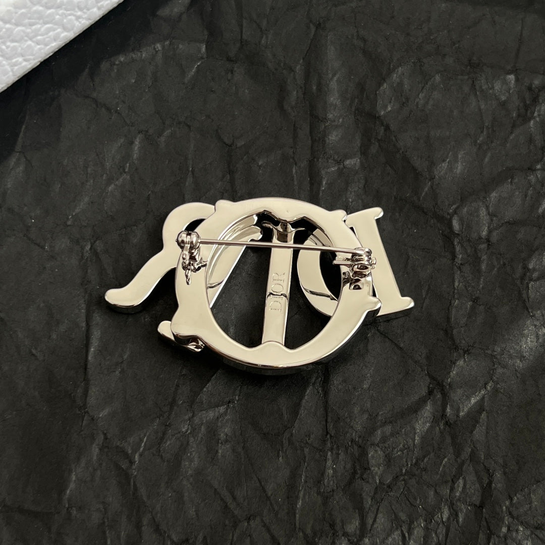 CD New Alphabet brooch