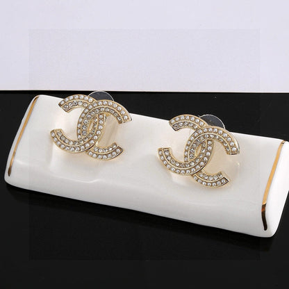 Chan New Double C earrings